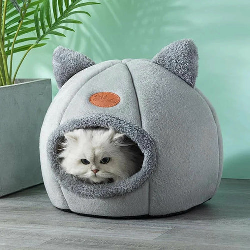 Pawfy Land fluffy cat resting inside grey dome cat house bed with ears