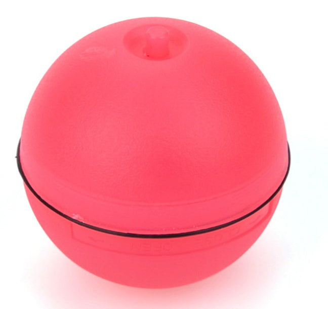 Red electronic toy ball for cats with impact-resistant shell.