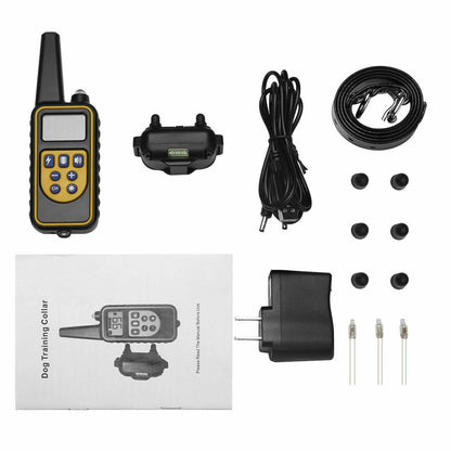 Handheld transmitter with orange receiver unit and contacts.