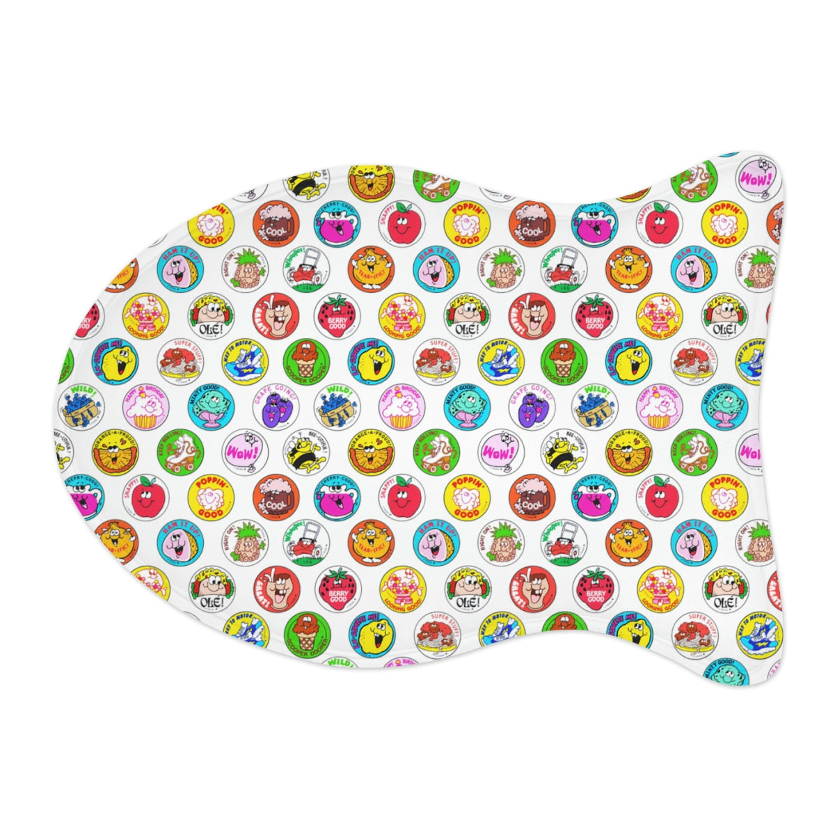 Fish-shaped pet feeding mat with bright cartoon circles on white background, top view.
