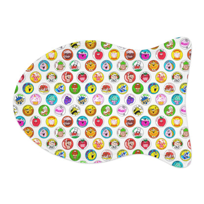 Fish-shaped pet feeding mat with bright cartoon circles on white background, top view.