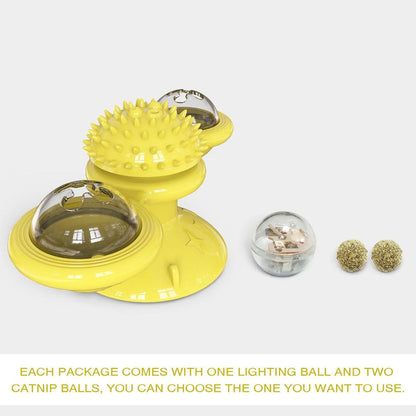 Yellow spinning cat toy with one light-up ball and two catnip balls included in the box