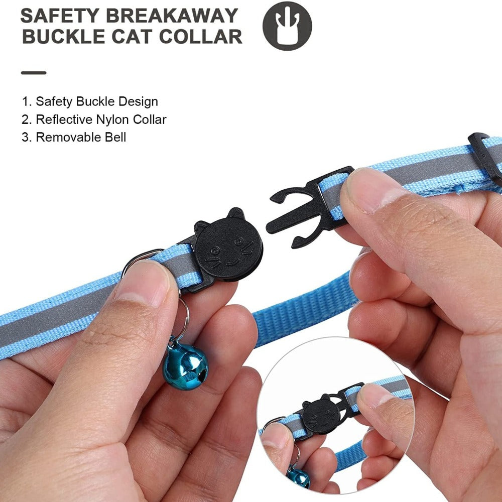 Close-up of hands opening the cat-shaped breakaway buckle and removable bell on the reflective collar.